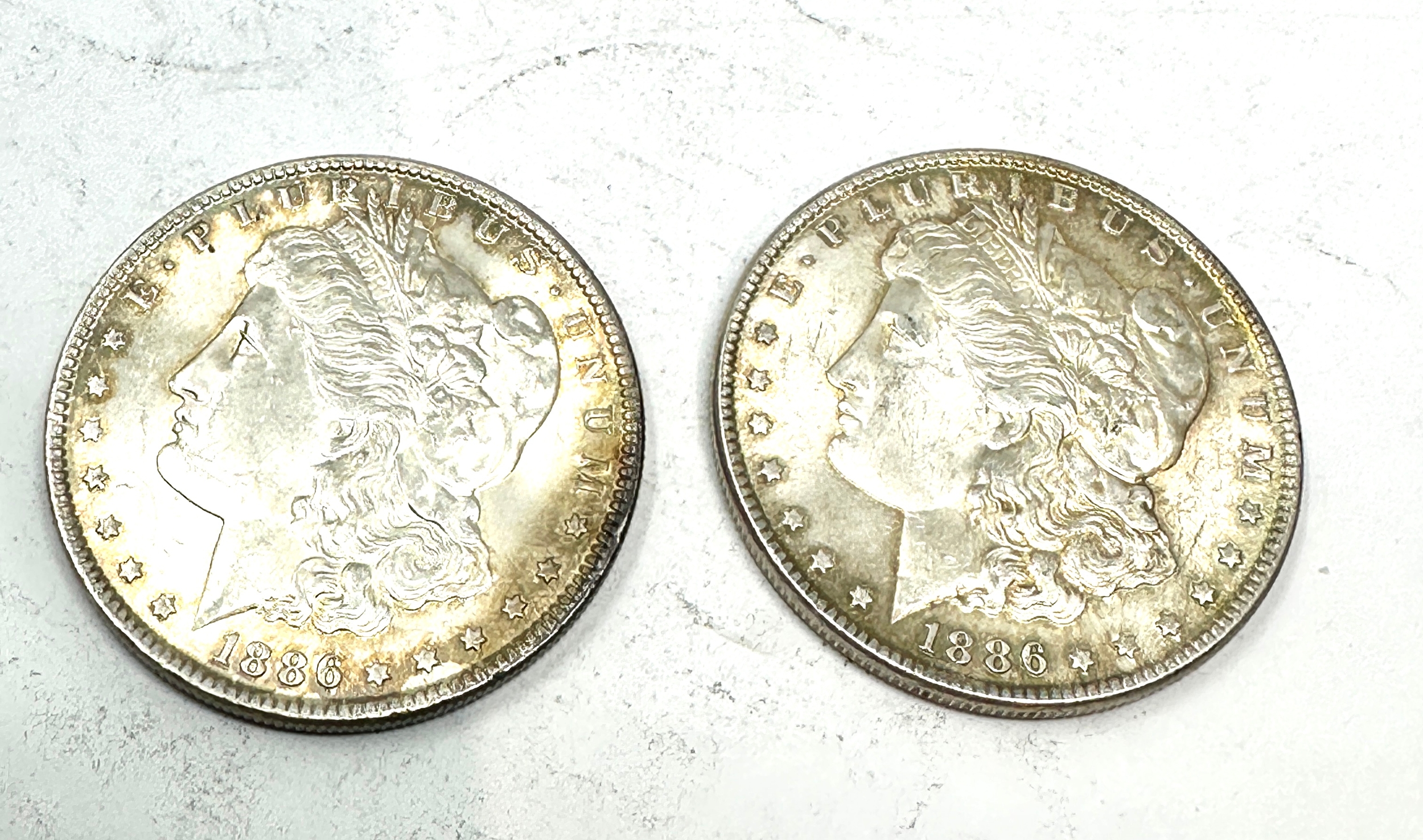 2 x 1886 morgan one dollar coins high grade