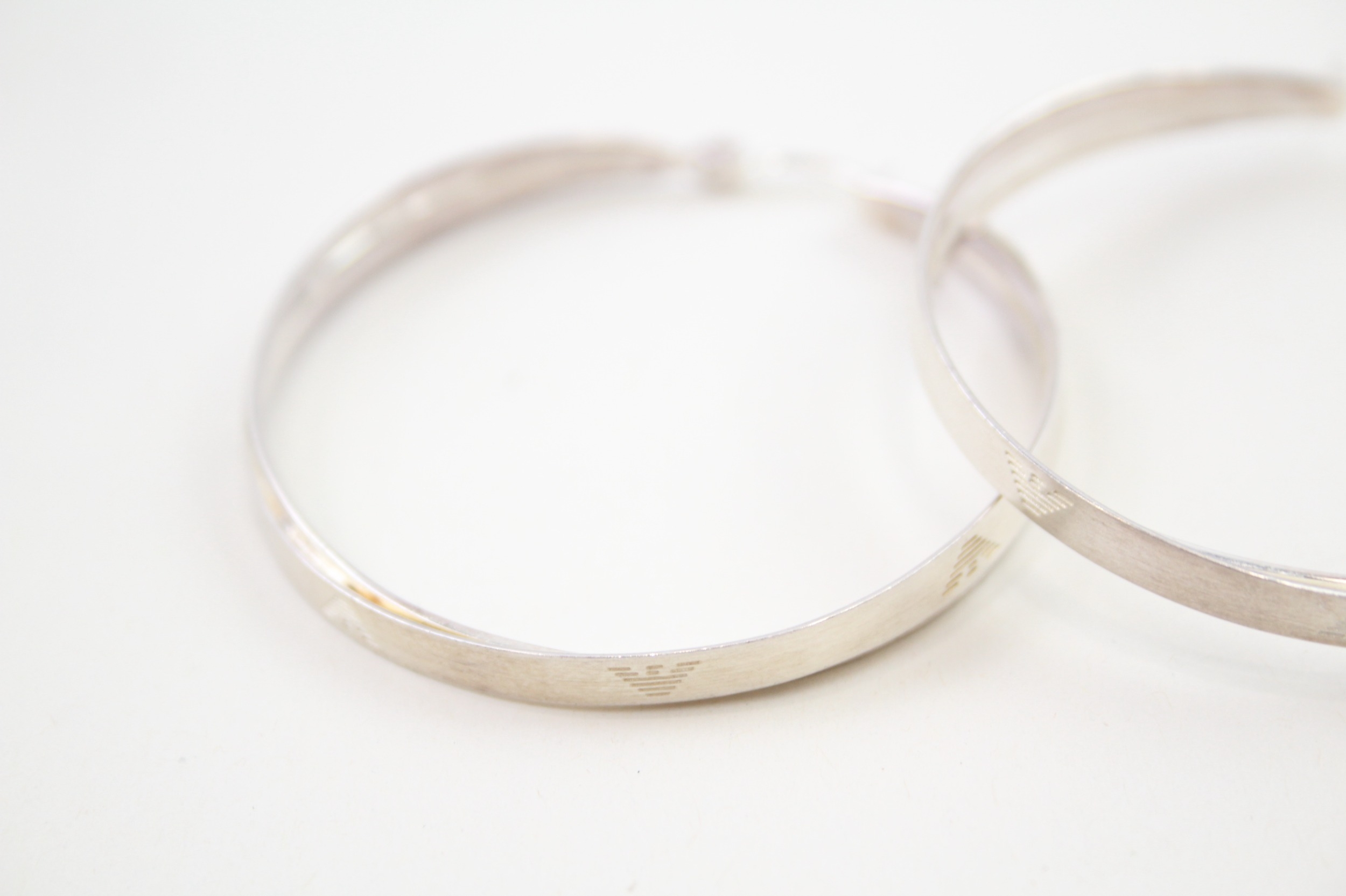 A pair of silver hoop earrings by Emporio Armani (14g) - Image 4 of 5