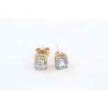 9ct gold blue topaz stud earrings with scroll backs (1.4g)