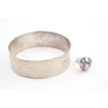 A silver modernist textured bangle and a mid century ring (62g)