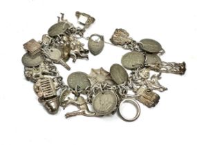 Vintage silver charm bracelet and charms weight 78g