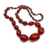 Antique / vintage cherry bakelite graduated bead necklace largest bead measures approx 30mm by