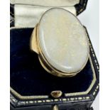 9ct gold ring set with very large opal that measures approx 31mm by 22mm weight of ring 10.5g