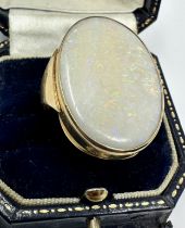 9ct gold ring set with very large opal that measures approx 31mm by 22mm weight of ring 10.5g