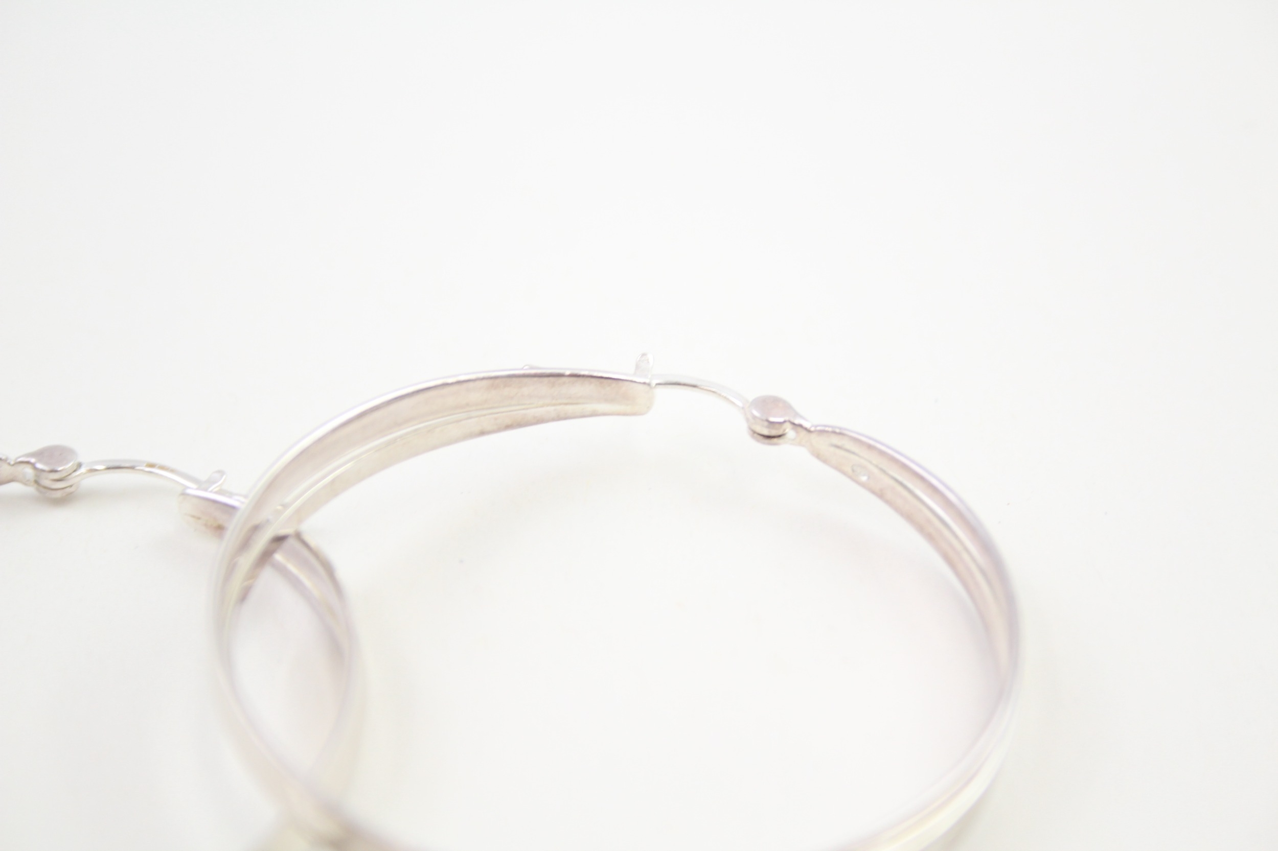 A pair of silver hoop earrings by Emporio Armani (14g) - Image 3 of 5