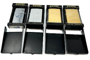 4 as new Zippo lighters all original boxed
