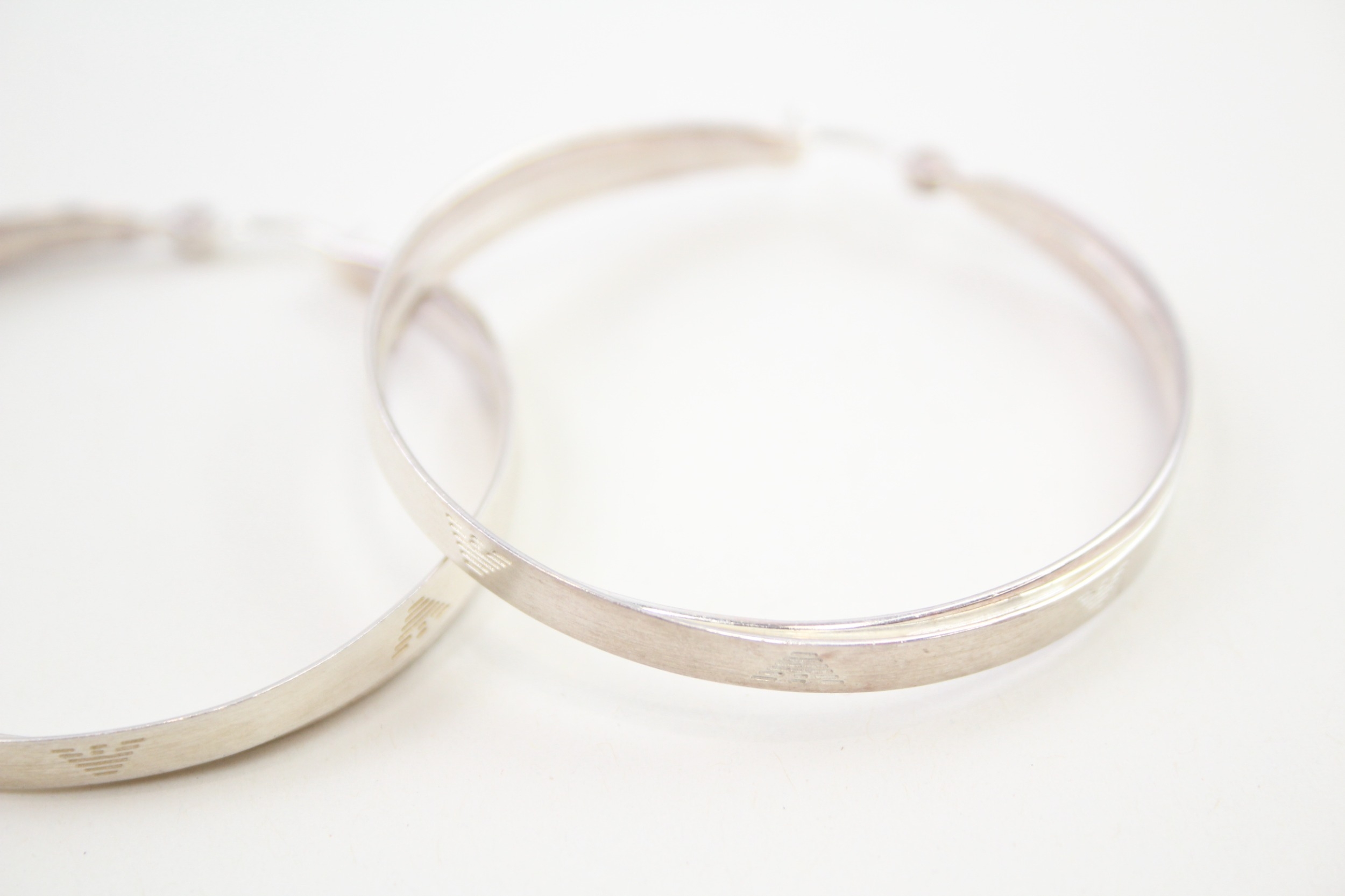 A pair of silver hoop earrings by Emporio Armani (14g) - Image 2 of 5