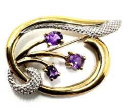 9ct gold amethyst & diamond brooch measures approx 4cm by 2.2cm weight 3.7g
