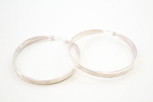 A pair of silver hoop earrings by Emporio Armani (14g)