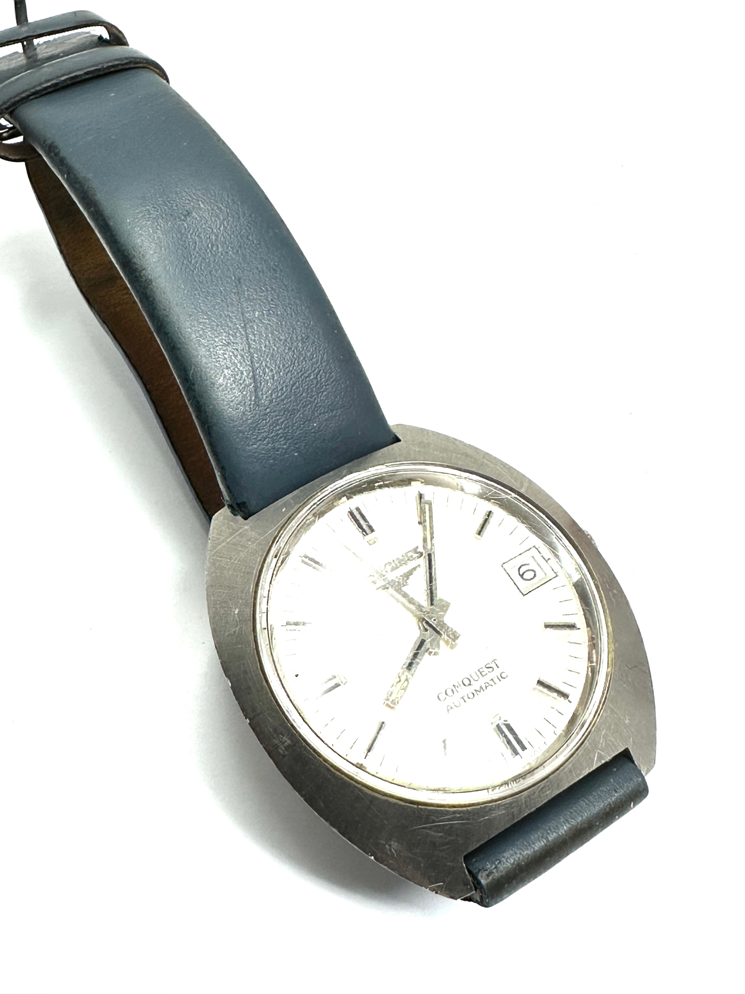 Vintage gents Longines conquest automatic wristwatch the watch is ticking when shaken but stops