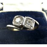 18ct gold diamond ring set with 2 diamonds each measure approx 4mm est 0.40ct weight 2.6g