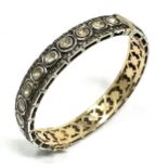 Rose diamond bracelet row of rose diamonds around bracelet with diamond halos set in silver and gold