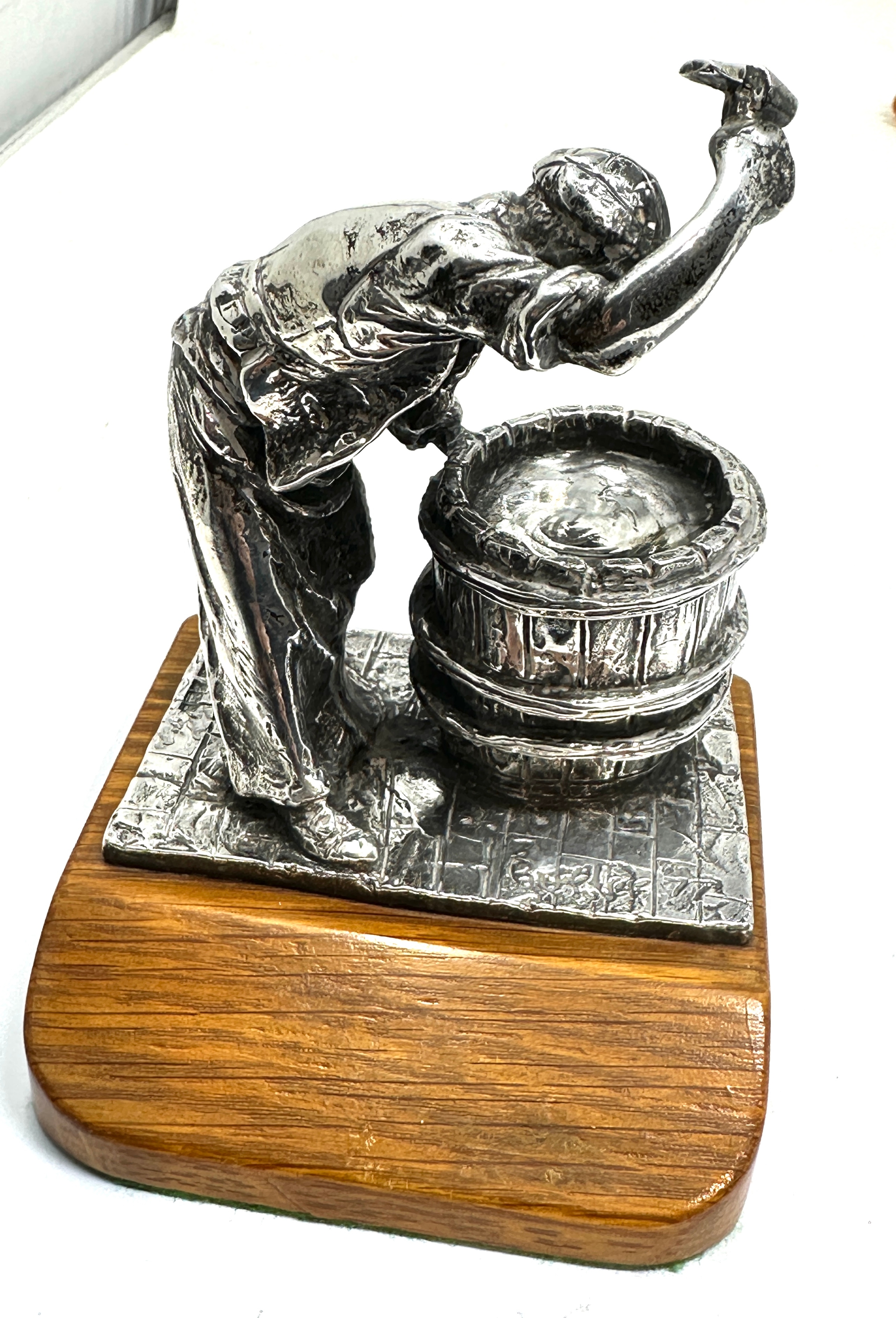 Heavy silver figure of a barrel maker on wooden base signed birmingham silver hallmarks figure