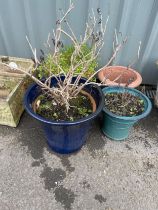 Selection of assorted plant pots includes glazed etc largest measures approximately 9 inches tall