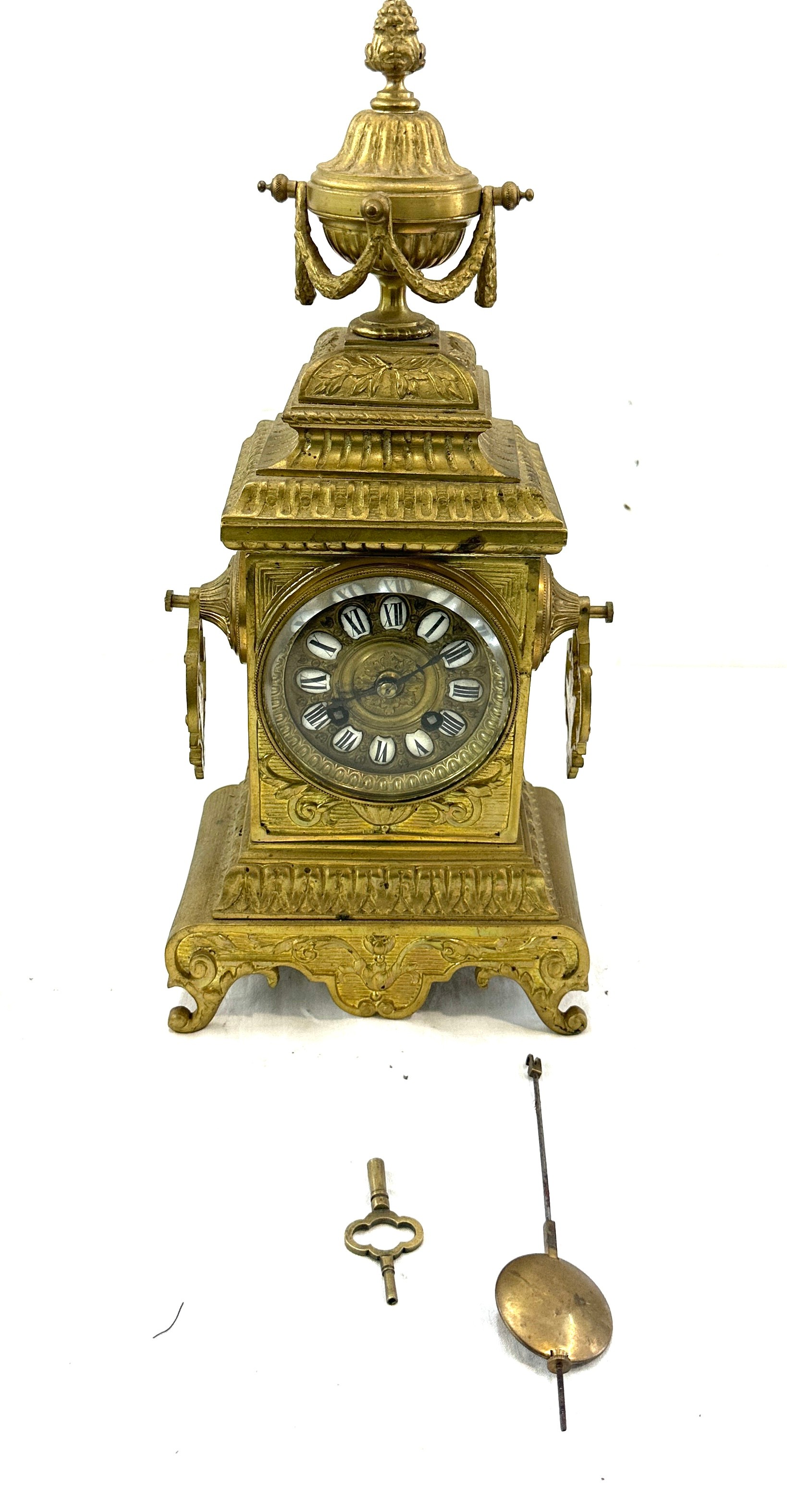 Vintage brass 2 key hole mantel clock with key and pendulum, approximate measurements Height 16
