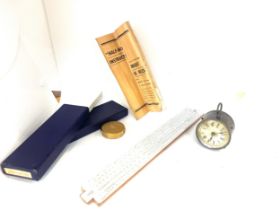 Selection of collectables includes slide rule, and a antique 1887 clock