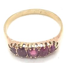 9ct gold 5 sone garnet dress ring. 2.6grams