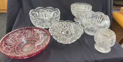 Selection of glass fruit bowls to include coloured glass and cut glass, largest measures