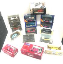 Selection of Corgi cars includes Austin Healey, Fawlty Towers, The London scene etc