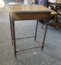 Oak bobbin legged occasional table measures approx 31 inches tall, 24 inches wide and 18 deep