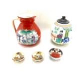 Selection of oriental items to include jug, small dishes - some with character marks to base