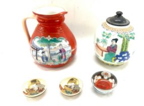 Selection of oriental items to include jug, small dishes - some with character marks to base