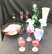 Selection of assorted coloured glass includes decanter, vases etc