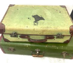 Two vintage suitcases largest measures 30 inches wide, 18 inches deep and 9.5 tall