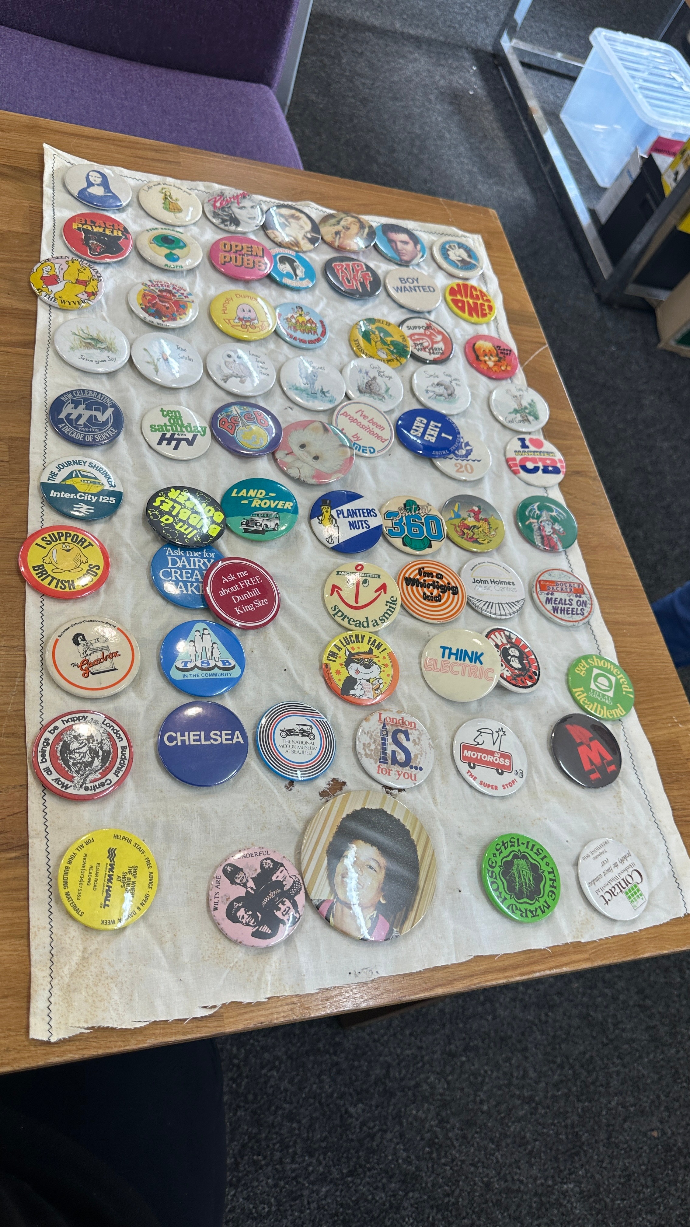 Large selection of assorted pin badges