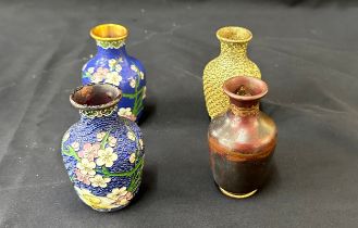 Set of four Cloisonné vases showing the four stages of production 4" high.