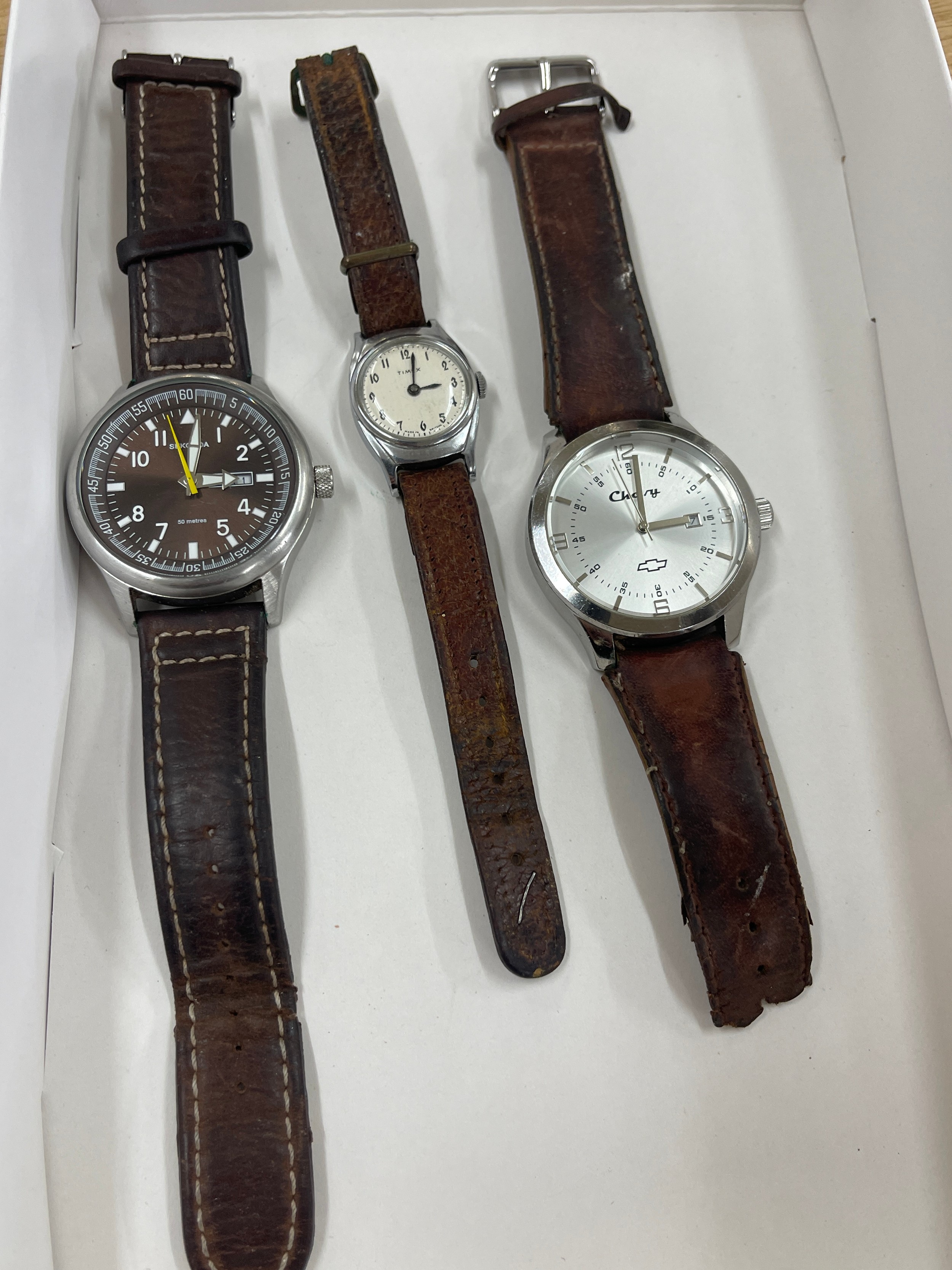 Selection of three wrist watches includes Timex, sekonda etc