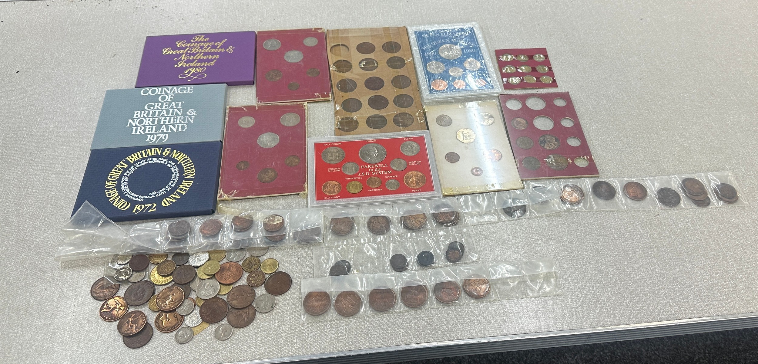 Selection of assorted coin sets includes The Coinage of Great Brittain 1980, 1979 etc