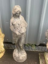 Tall concrete garden statue, height approximately 34 inches