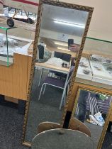 2 Framed mirrors and a frameless mirror largest measures 48 inches tall 14 inches wide