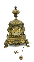 Vintage brass 2 key hole mantel clock with key and pendulum, approximate measurements Height 17