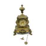 Vintage brass 2 key hole mantel clock with key and pendulum, approximate measurements Height 17