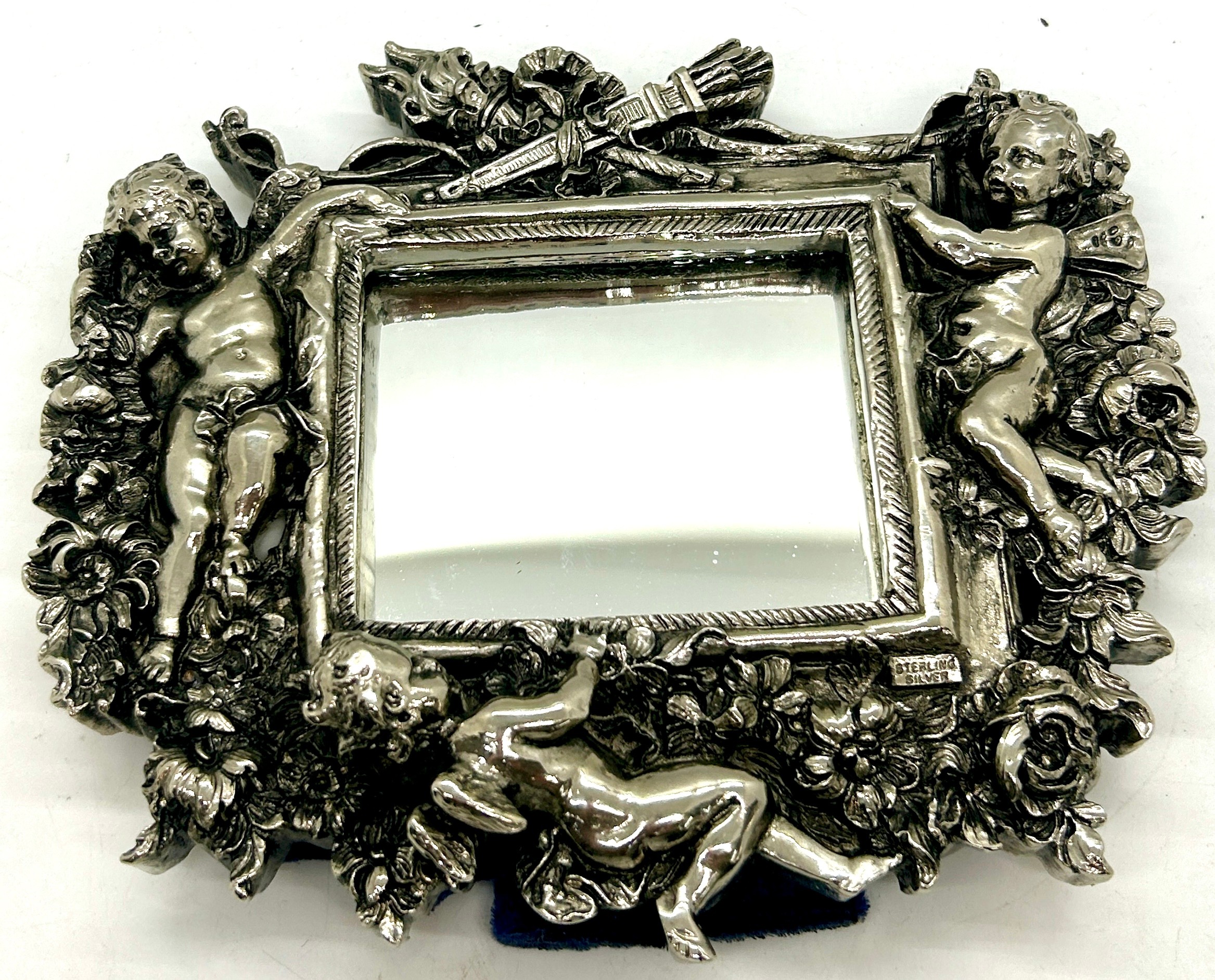 Sterling silver overlay cherub small mirror, approximate measurements: 16 x 18.5cm