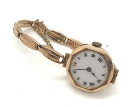 9ct Gold case and expand b.let, enamel dial ladies watch 17.5 grams