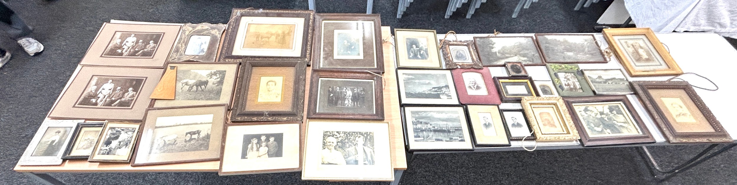 Large selection of framed antique photos largest measures approximately 16 inches by 16 inches