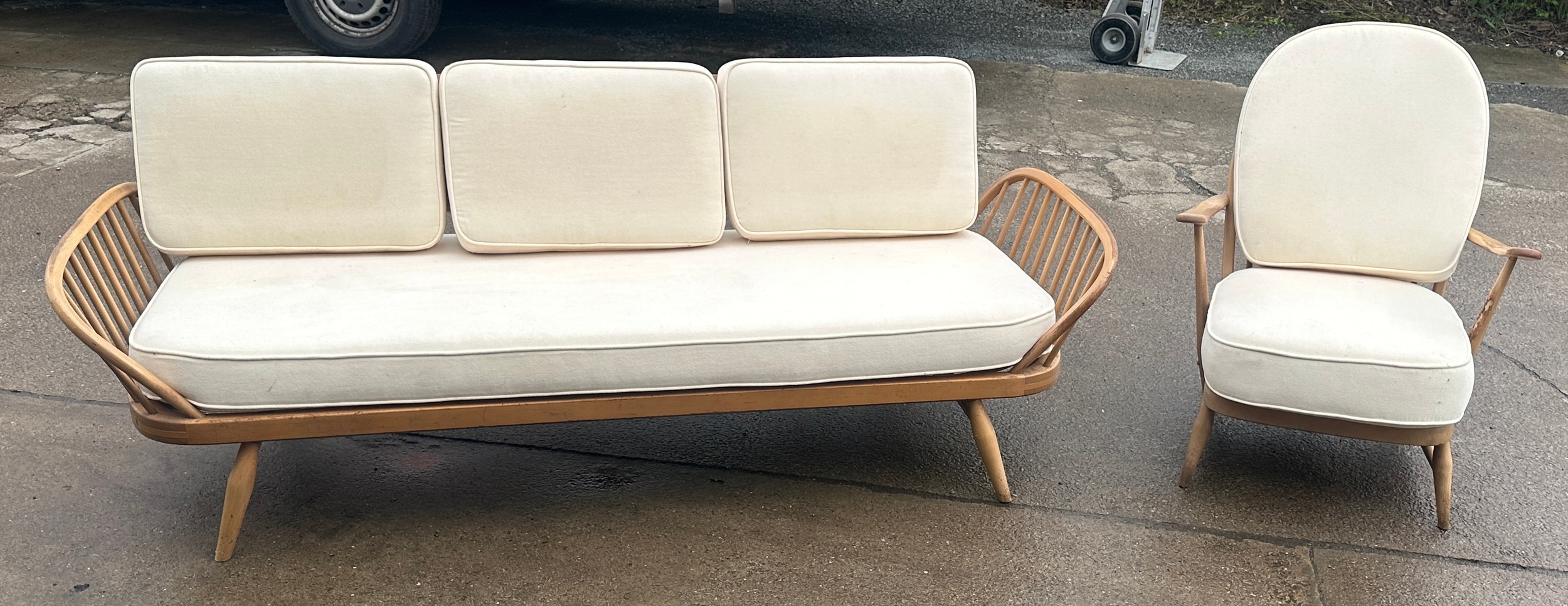 Ercol sofa and chair with cushions, approximate measurements: 82 inches width x 32 inches depth x 29