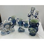 Selection of blue and white pottery includes figures, jugs etc