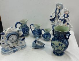 Selection of blue and white pottery includes figures, jugs etc