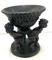 Resin cherub centre piece measures approx 11 inches tall by 2.5 wide