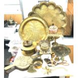 Large selection of brassware to include an oriental charger, tray etc
