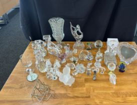 Large selection of assorted glassware includes figures, photo frames etc