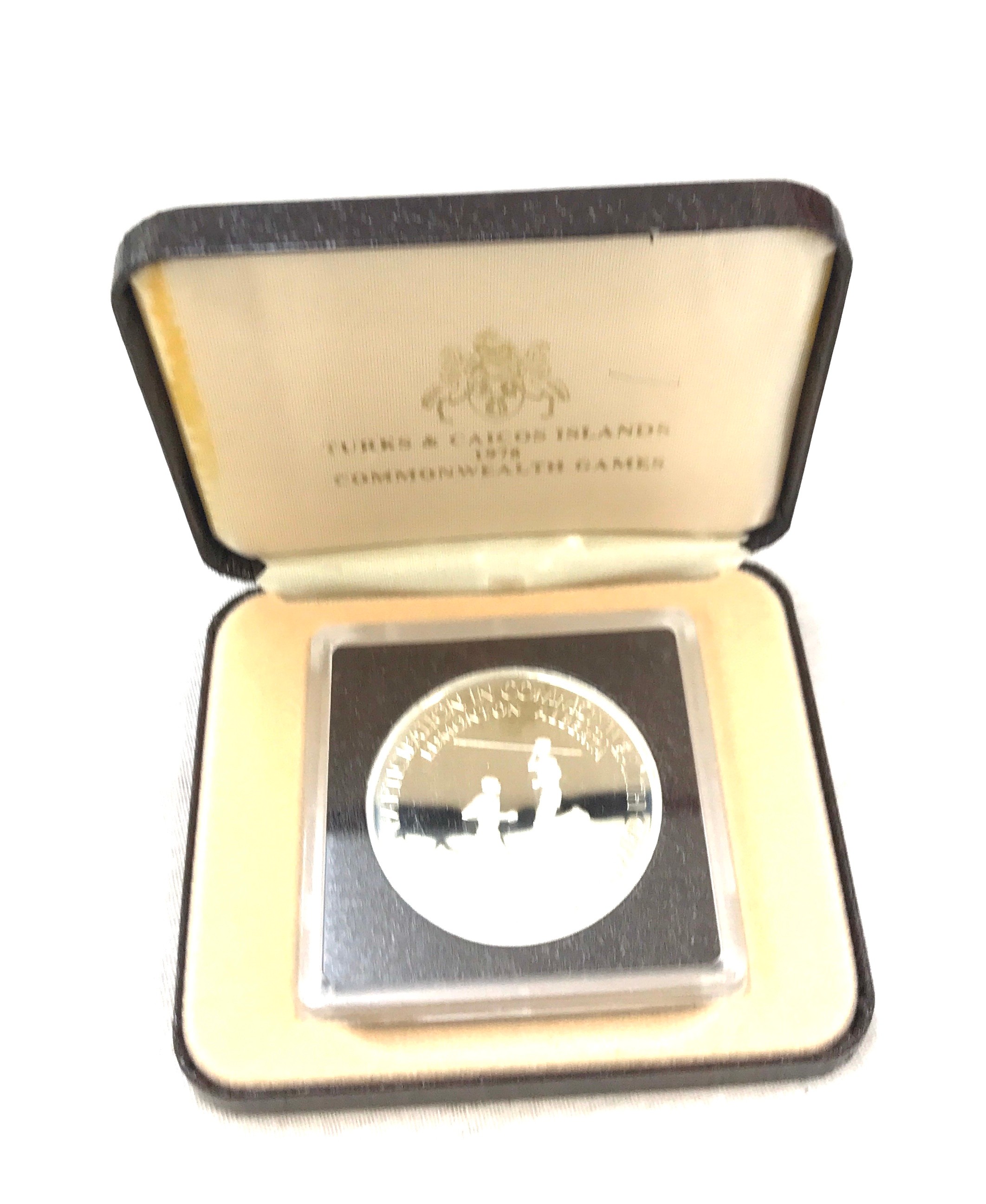 Cased 1978 Turks and Caicos Islands commonwealth games 20 crown silver proof coin with COA - Image 2 of 4