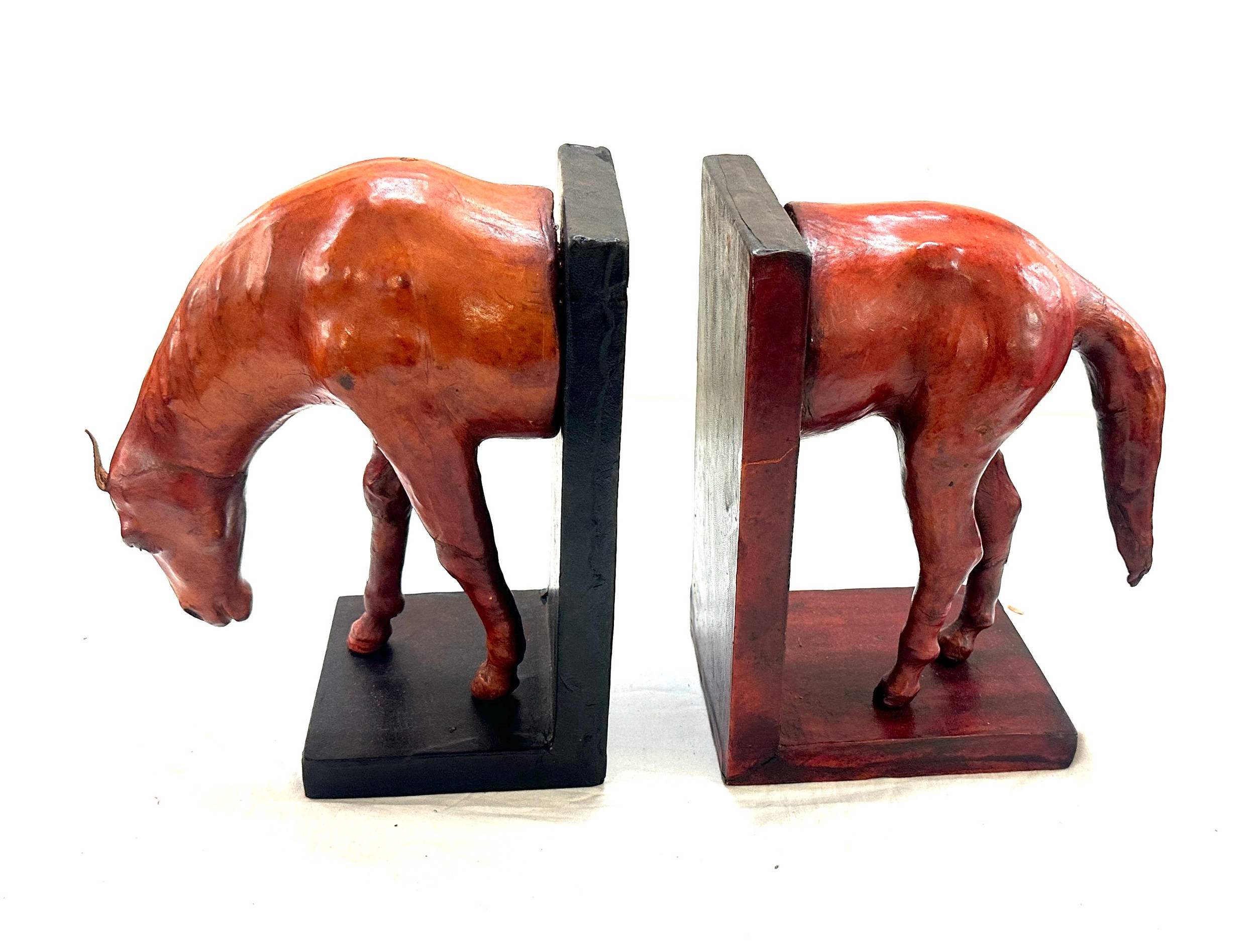 Large leather horse bookends 10 inches by 5 inches colour difference visible
