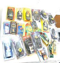 Selection vintage mobile phone covers to include Batman, Star Trek, Thunderbirds, Looney Tunes,