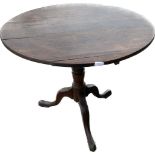 Antique three legged tilt top table measures approx 28 inches tall by 31 inches diameter