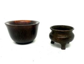 Miniature brass three legged bowl, marks to base and one other